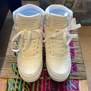 Never worn white high top sneakers. Euro size 38.